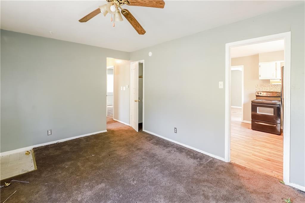 Photo 3 of Single Family Residence at 7815 Ozark Rd, Kansas City, MO 64129 | MLS# 2517227 | | Sold on 2025-03-10