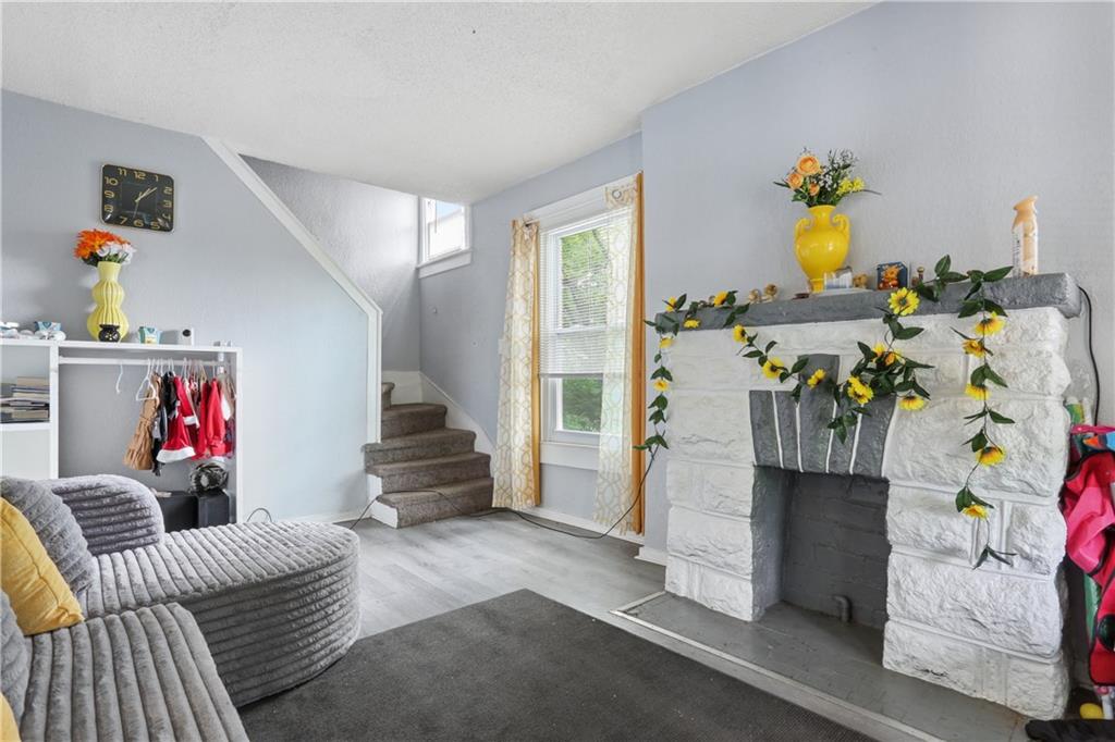 Homes for sale in Kansas City, MO | 3731 Olive St, Kansas City, MO 64109 | MLS# 2607678