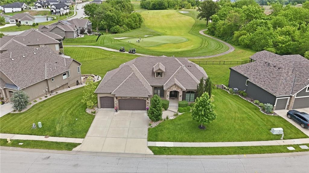1st image of 906 Creekmoor Dr, Raymore, MO 64083 | MLS# 2621398
