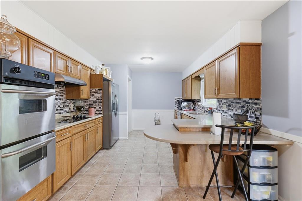 Photo 4 of Single family home for sale at 6316 Hedges Ave, Raytown, MO 64133 | MLS# 2626390 | Listing updated on 2026-09-03