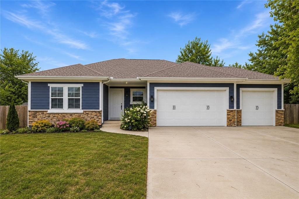 1st image of 1401 Rylee Ct, Raymore, MO 64083 | MLS# 2627076