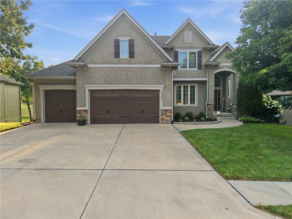 2nd image of 1502 Cross Creek Dr, Raymore, MO 64083 | MLS# 2628652