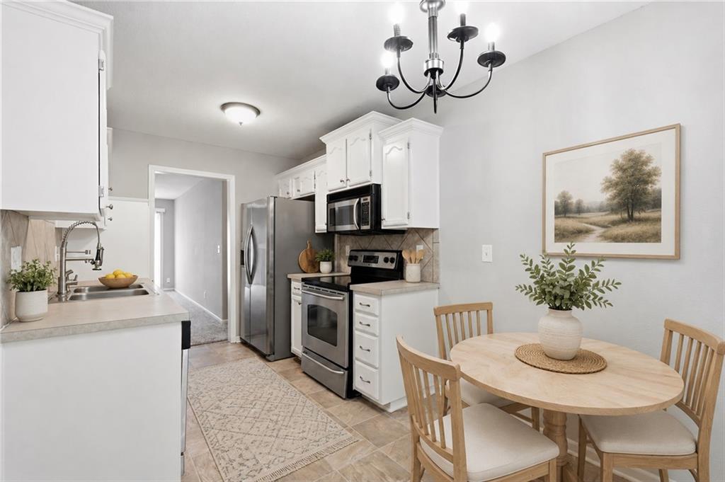 3rd image of 1306 Ashley Dr, Grain Valley, MO 64029 | MLS# 2631915