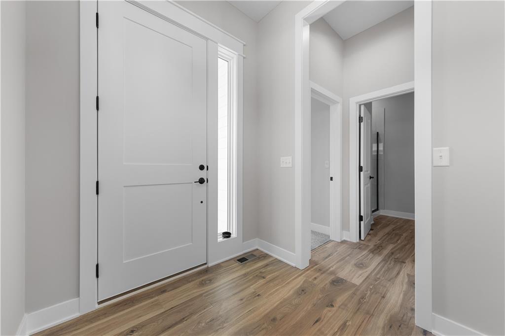 3rd image of 1148 Sw Whitby Dr, Raymore, MO 64083 | MLS# 2632400