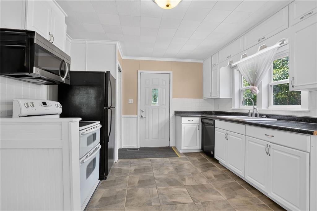 5th image of 7614 Woodson Rd, Raytown, MO 64138 | MLS# 2633201