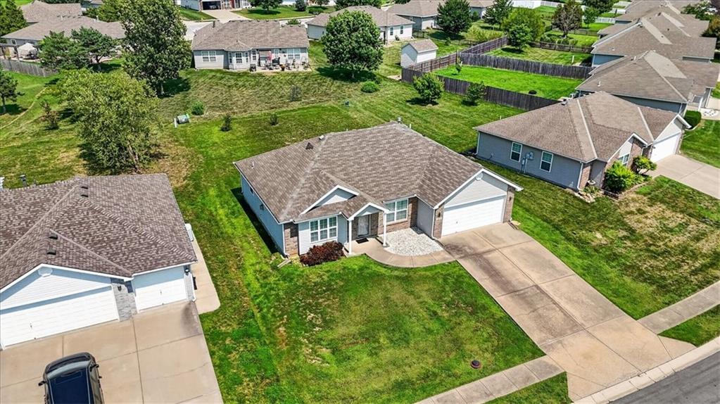 56th image of 1104 Carlisle Dr, Raymore, MO 64083 | MLS# 2633438