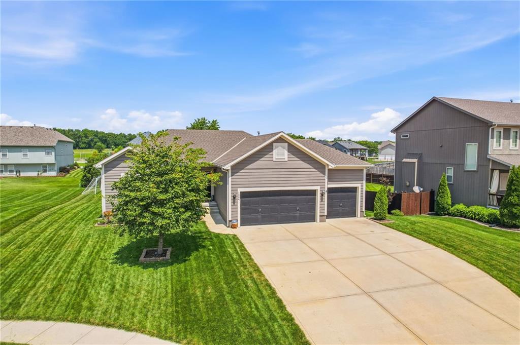3rd image of 1904 Red Bud Ct, Raymore, MO 64083 | MLS# 2633663