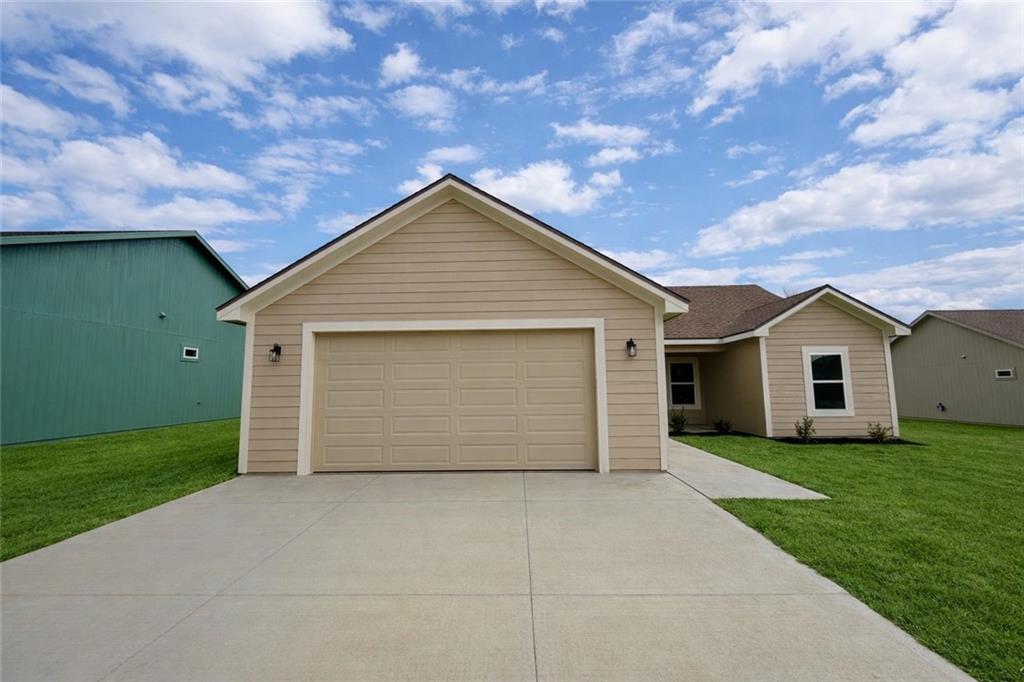 1st image of 1309 Ne White Oaks Ln, Oak Grove, MO 64075 | MLS# 2633707