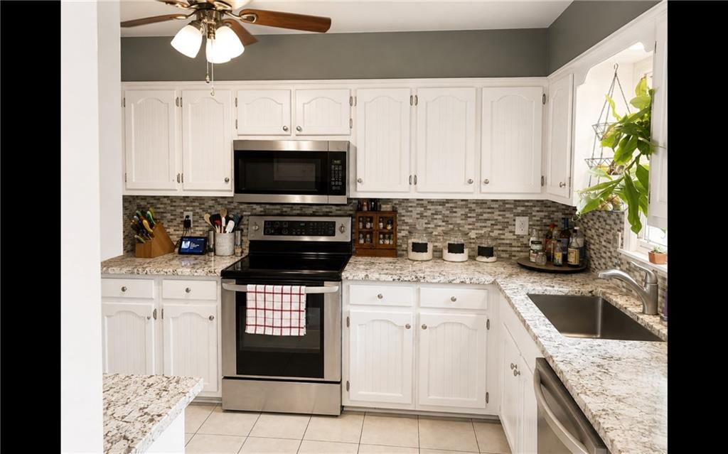 4th image of 506 S Monroe St, Raymore, MO 64083 | MLS# 2634158
