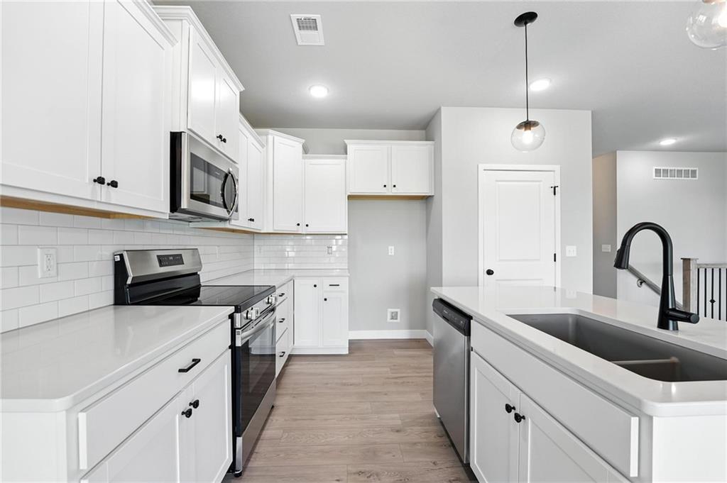 4th image of 12506 S White Ash Ln, Lee's Summit, MO 64086 | MLS# 2634783