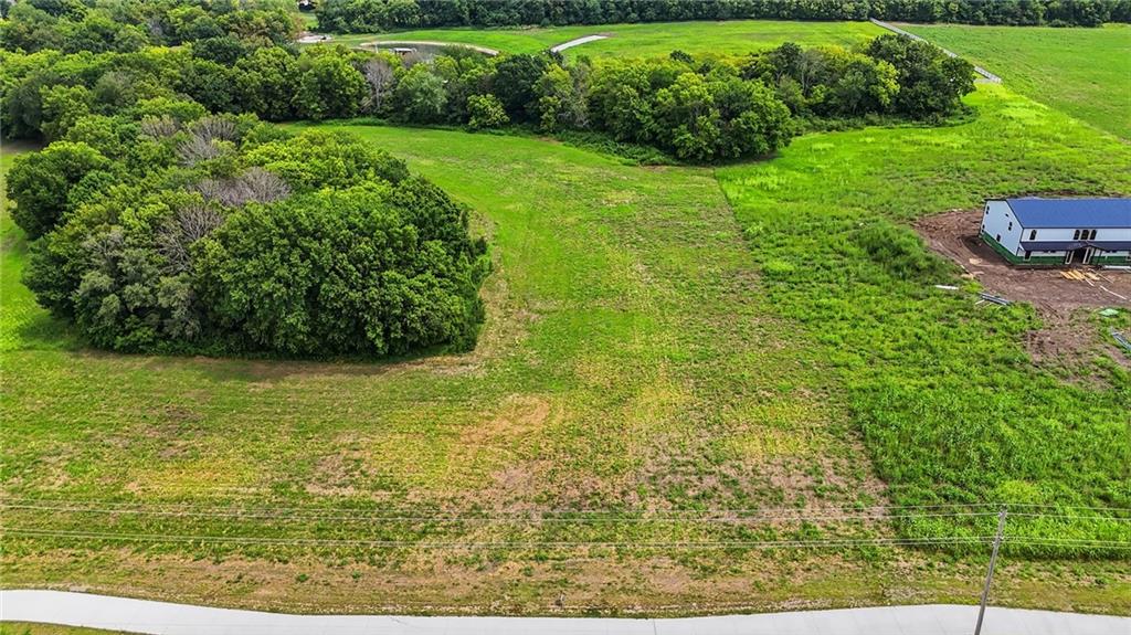 26th image of 1007 N Ward Rd, Raymore, MO 64083 | MLS# 2634915