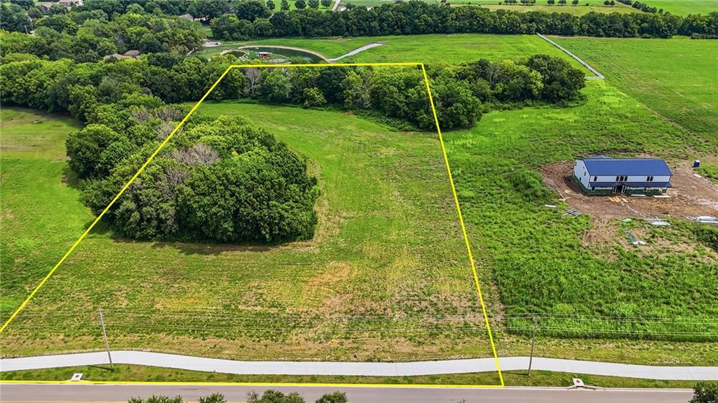 1st image of 1007 N Ward Rd, Raymore, MO 64083 | MLS# 2634915