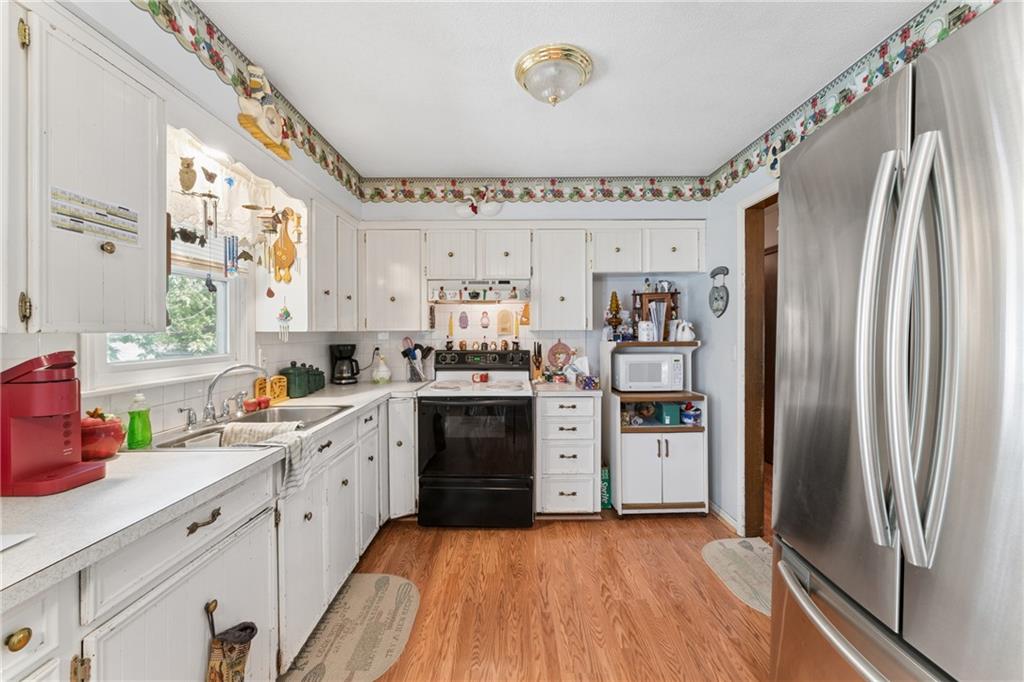 5th image of 9812 Hillcrest Rd, Kansas City, MO 64134 | MLS# 2635432