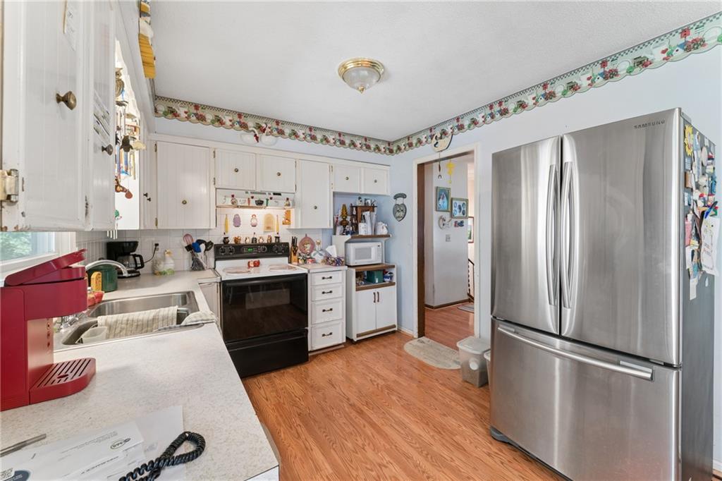 4th image of 9812 Hillcrest Rd, Kansas City, MO 64134 | MLS# 2635432