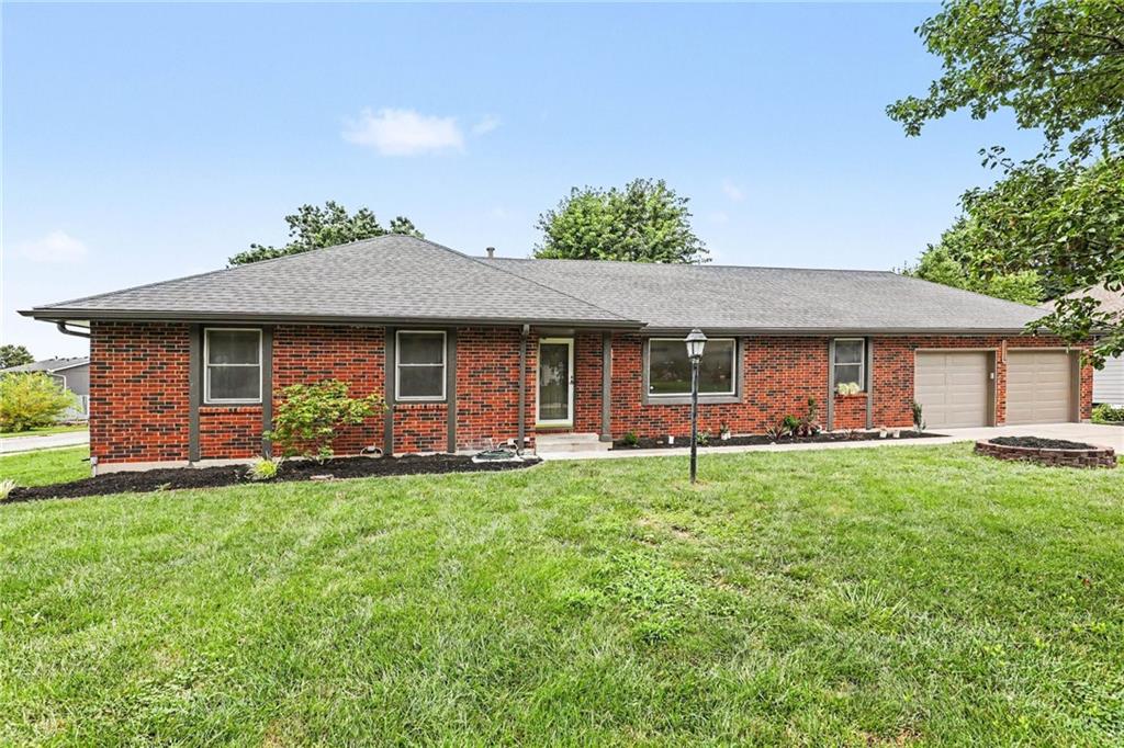 1st image of 300 N Woodson Dr, Raymore, MO 64083 | MLS# 2635517