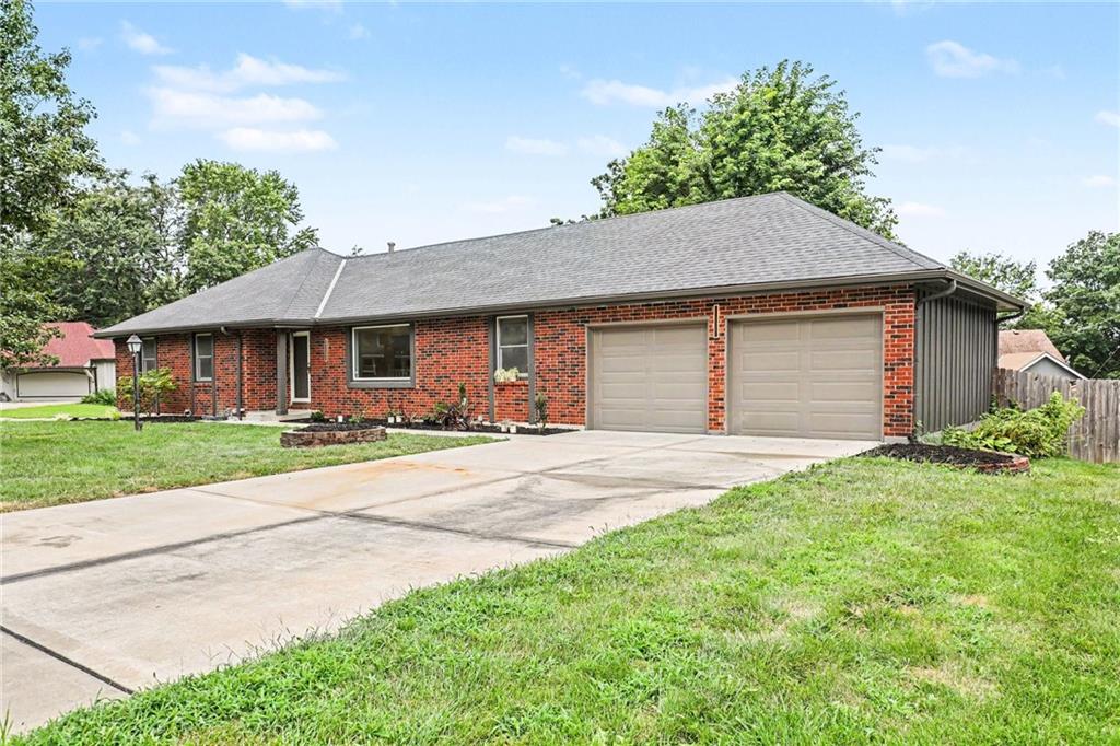3rd image of 300 N Woodson Dr, Raymore, MO 64083 | MLS# 2635517
