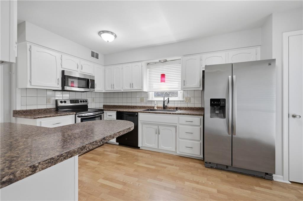 5th image of 7832 N Garfield Ave, Kansas City, MO 64118 | MLS# 2635656