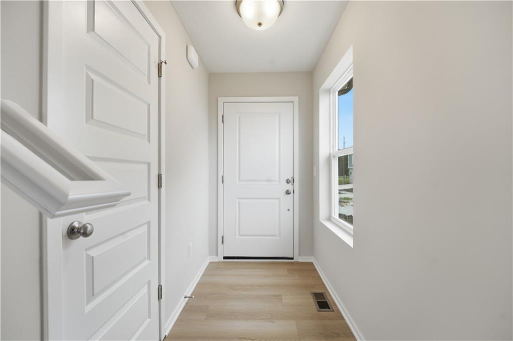 4th image of 1328 Se Windbreak Dr, Lees Summit, MO 64081 | MLS# 2635882