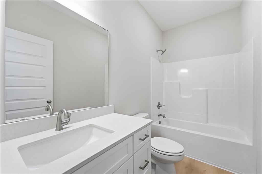4th image of 1217 Se Windbreak St, Lees Summit, MO 64081 | MLS# 2635888