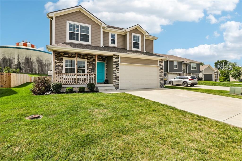 2nd image of 1705 Nw Hilltop Ct, Grain Valley, MO 64029 | MLS# 2636778