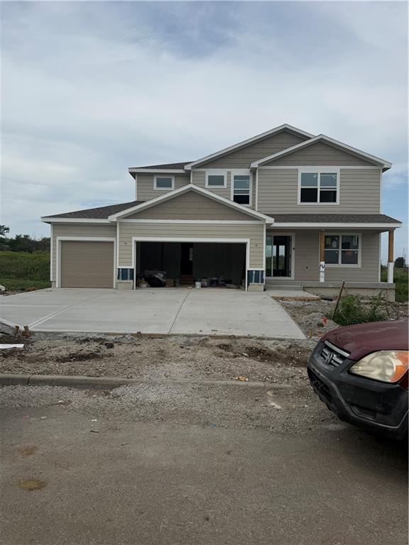 2nd image of 830 Reed Dr, Raymore, MO 64083 | MLS# 2636915