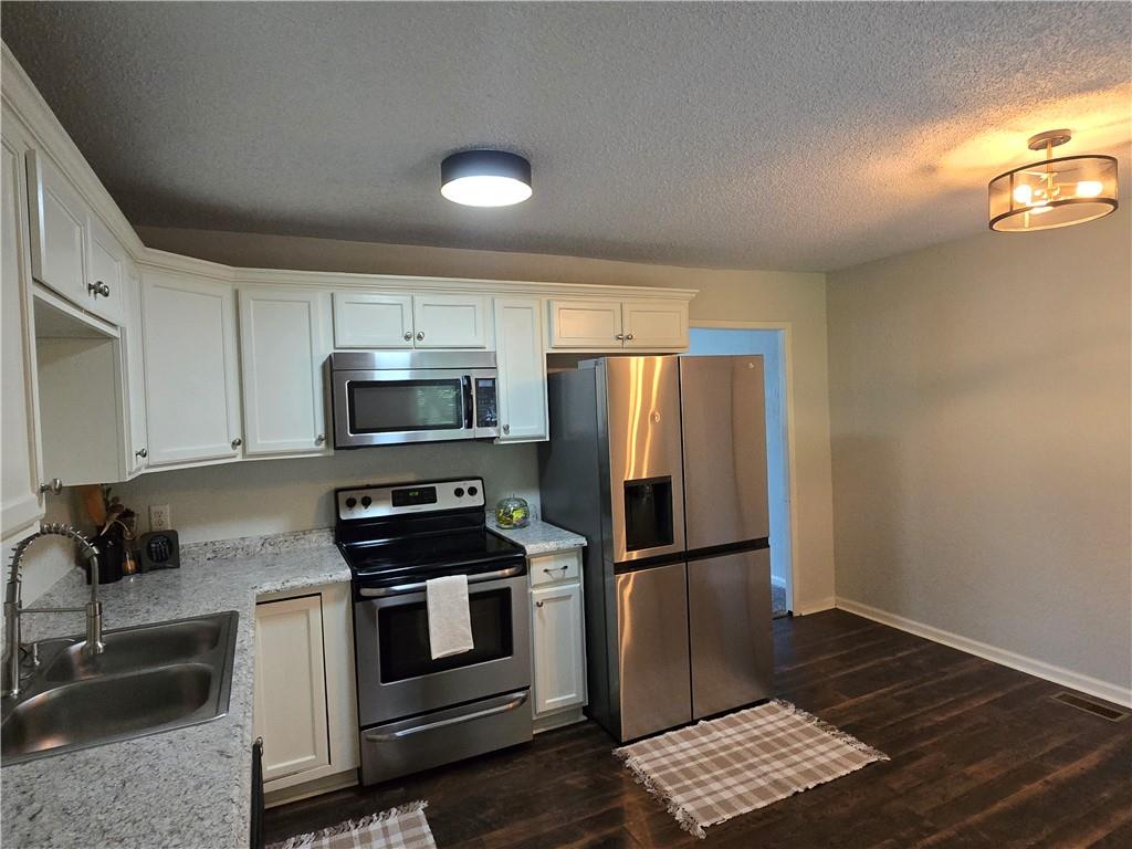 3rd image of 317 N Cochise Dr, Independence, MO 64056 | MLS# 2637009