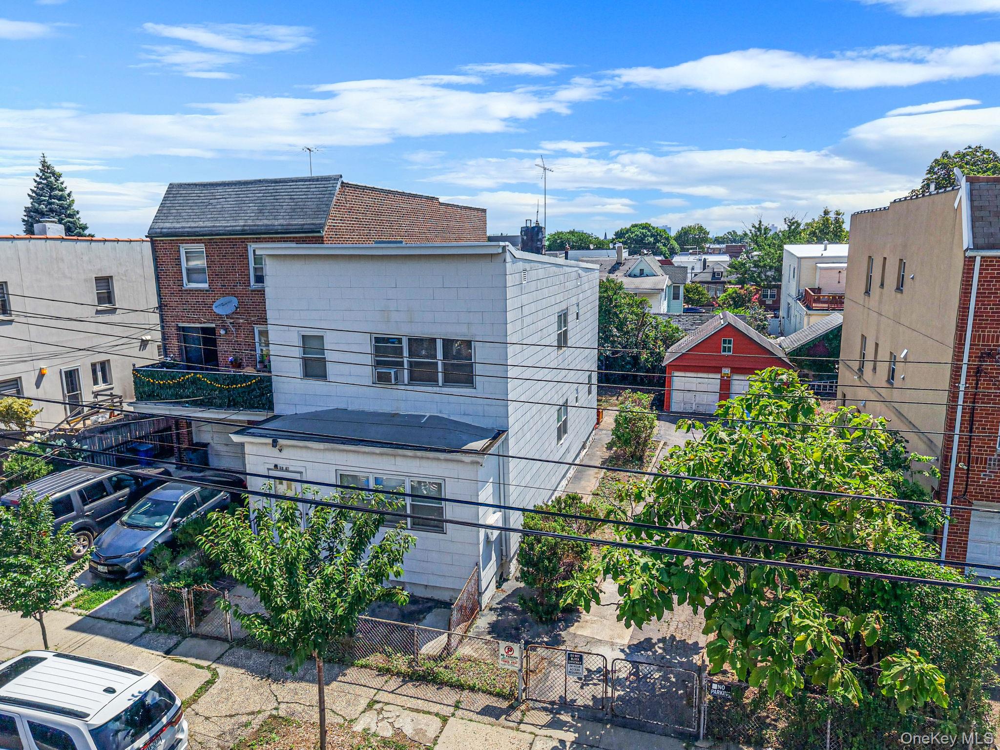 1st image of 52 67 72nd St, New York, NY 11378 | MLS# 1026875