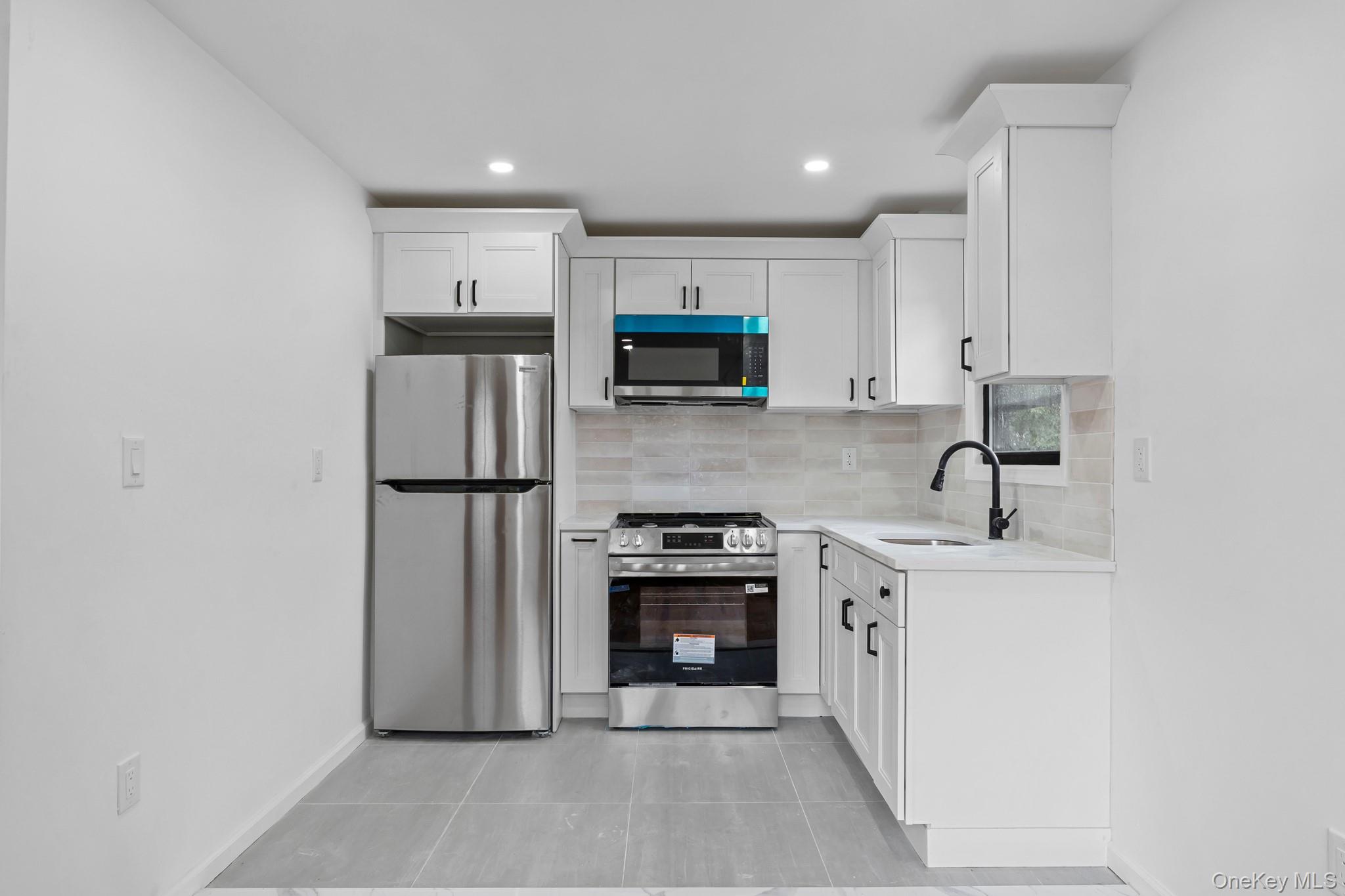 3rd image of 423 Beach 63Rd St, New York, NY 11692 | MLS# 1027246
