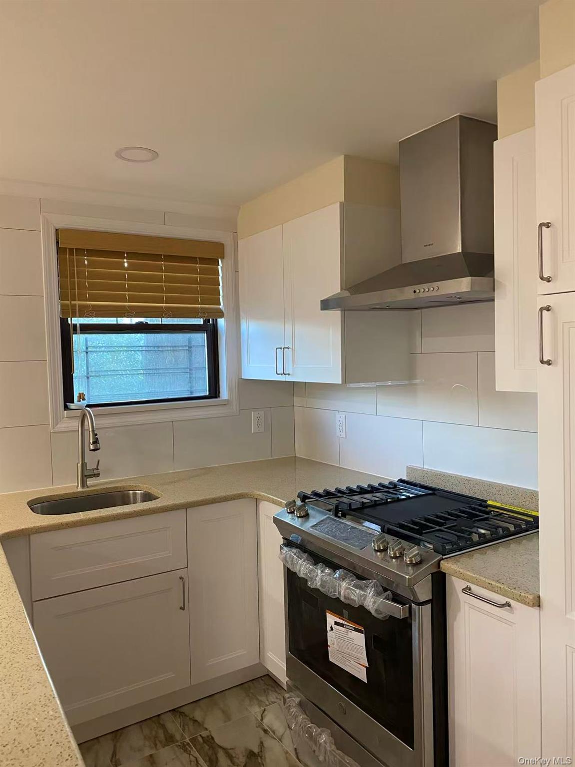 3rd image of 67-97 136th St, New York, NY 11367