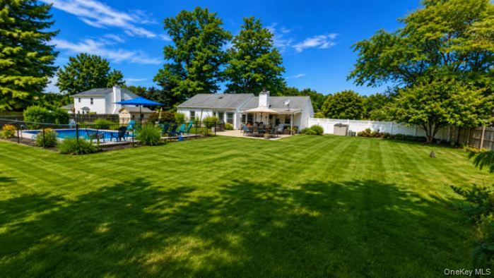2nd image of 9 Singingwood Dr, Brookhaven, NY 11790 | MLS# 1031310