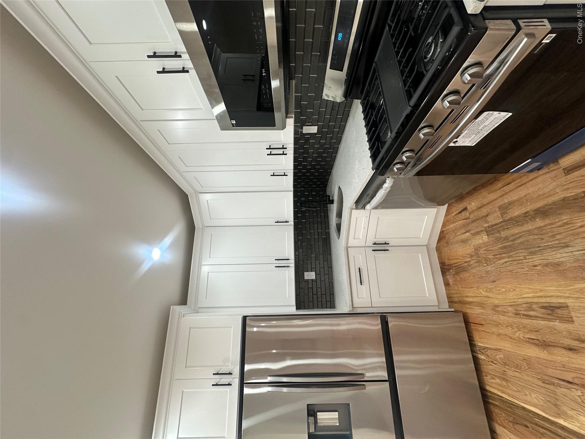 3rd image of 17205 89Th Ave, New York, NY 11432 | MLS# 1036269