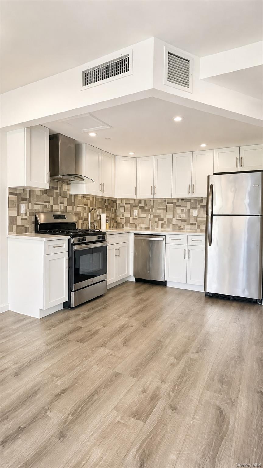 3rd image of 21410 15th Ave, New York, NY 11360