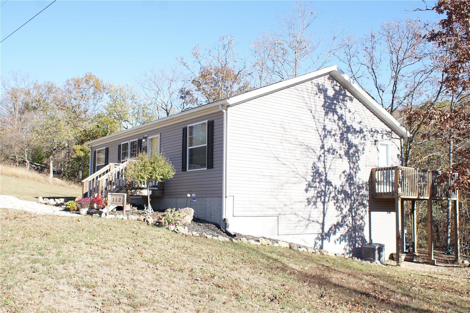 Homes for sale in Laurie, MO | 112 Mayerling Dr, Laurie, MO 65037 | MLS# 24076185