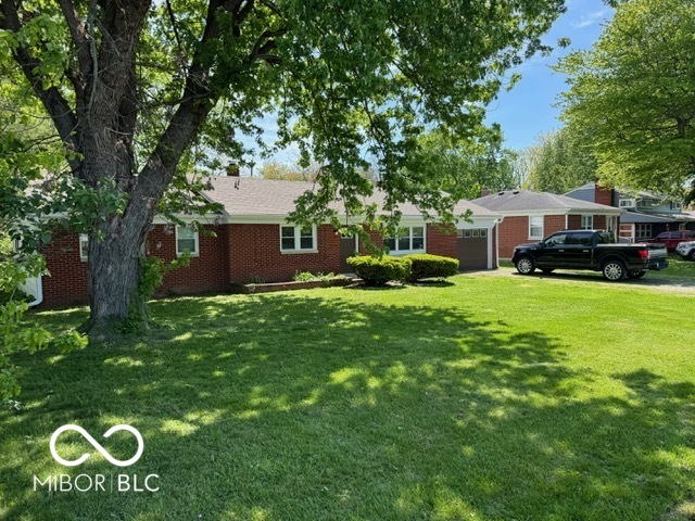 Homes for sale in Indianapolis, IN | 909 N Sadlier Dr, Indianapolis, IN 46219 | MLS# 22075486