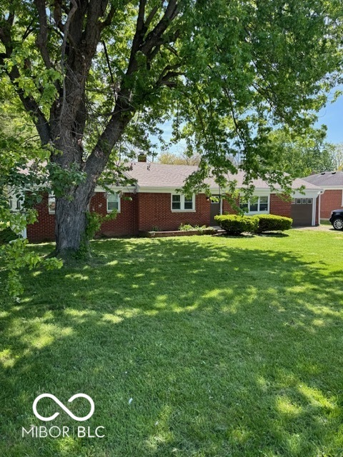 Homes for sale in Indianapolis, IN | 909 N Sadlier Dr, Indianapolis, IN 46219 | MLS# 22075486