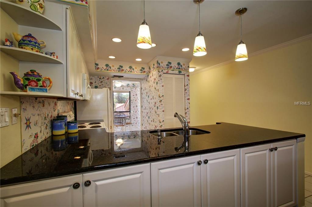 Photo 4 of Condominium at 4780 Brittany Dr S #114, Saint Petersburg, FL 33715 | MLS# T2815876 | | Sold on 2016-05-31