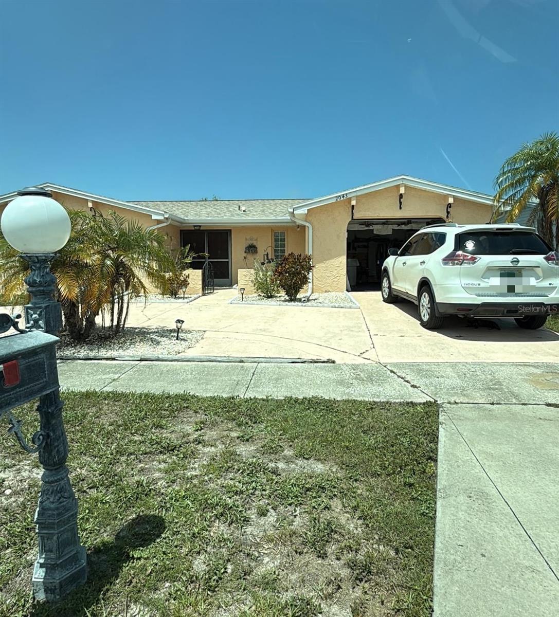 Homes for sale in Holiday, FL | 2043 Sugarbush Dr, Holiday, FL 34690 | MLS# TB8394656