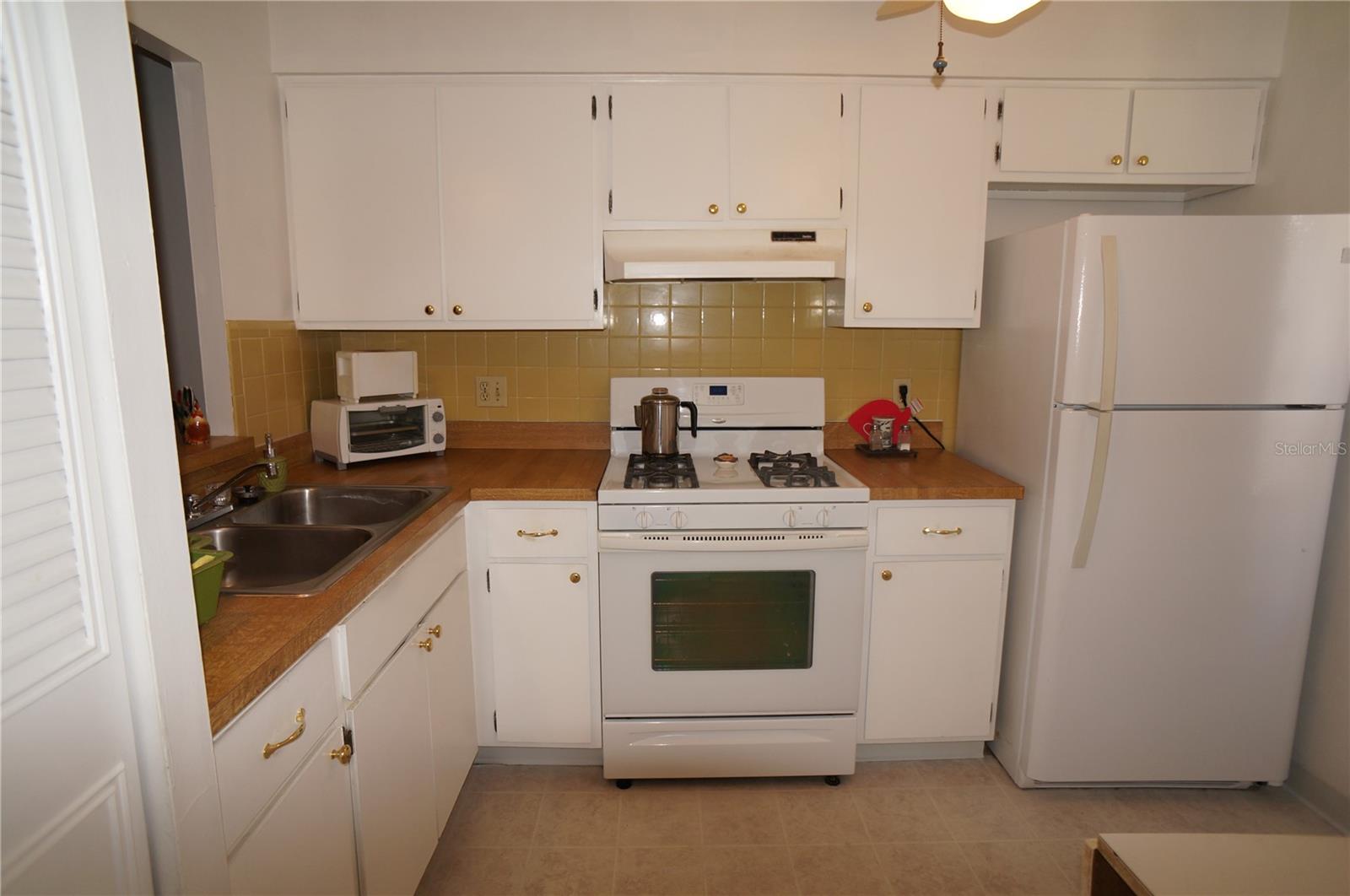 Homes for sale in Clearwater, FL | 1406 Arrowhead Cir W, Clearwater, FL 33759 | MLS# TB8395076