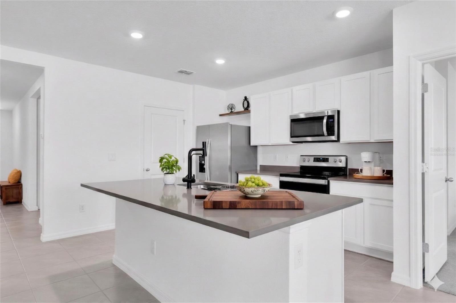 4th image of 5943 Wandering Willow Dr, Wesley Chapel, FL 33545 | MLS# TB8480627