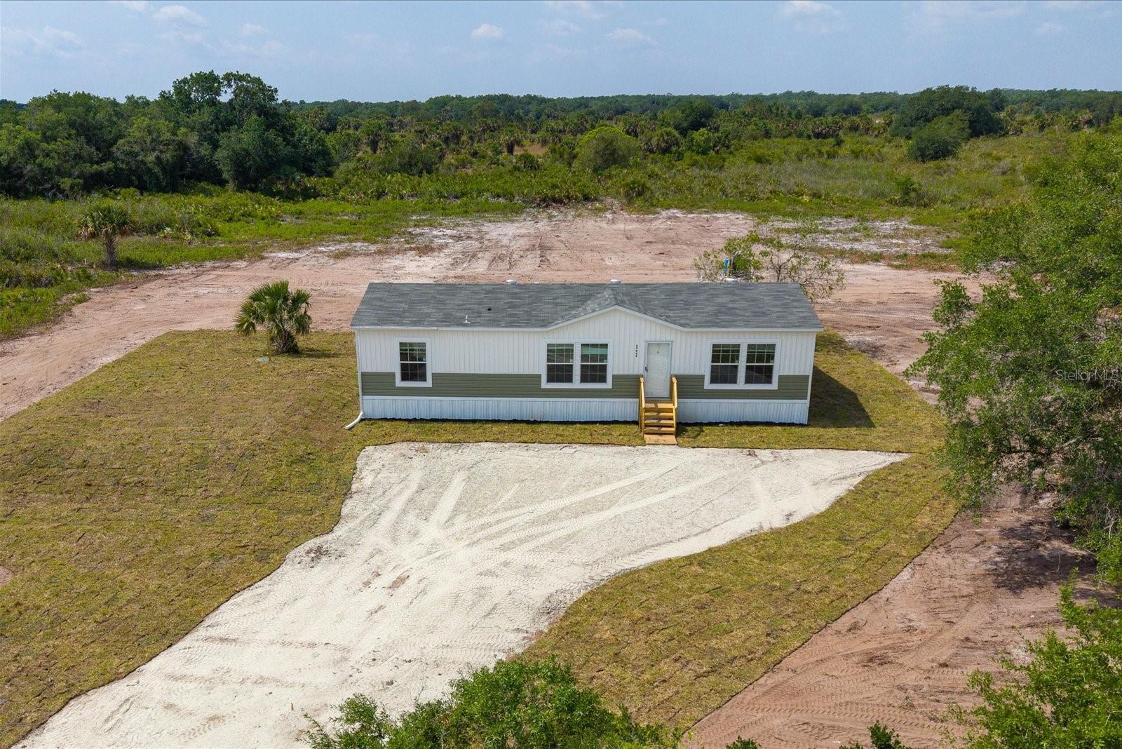 1st image of 20968 Nw 264th St, Okeechobee, FL 34972 | MLS# A4692526