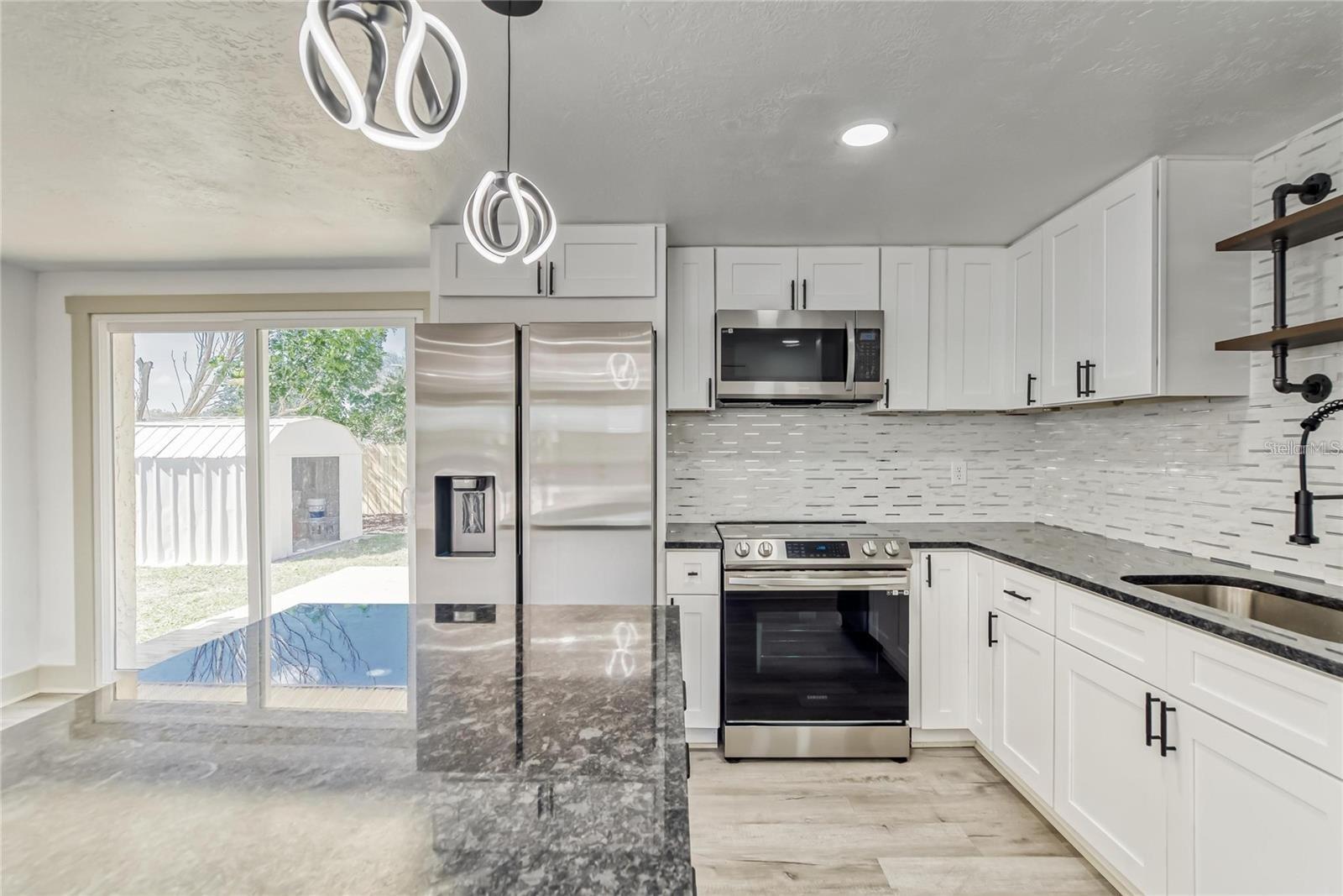 4th image of 1300 Melonwood Ave, Clearwater, FL 33759 | MLS# TB8522756