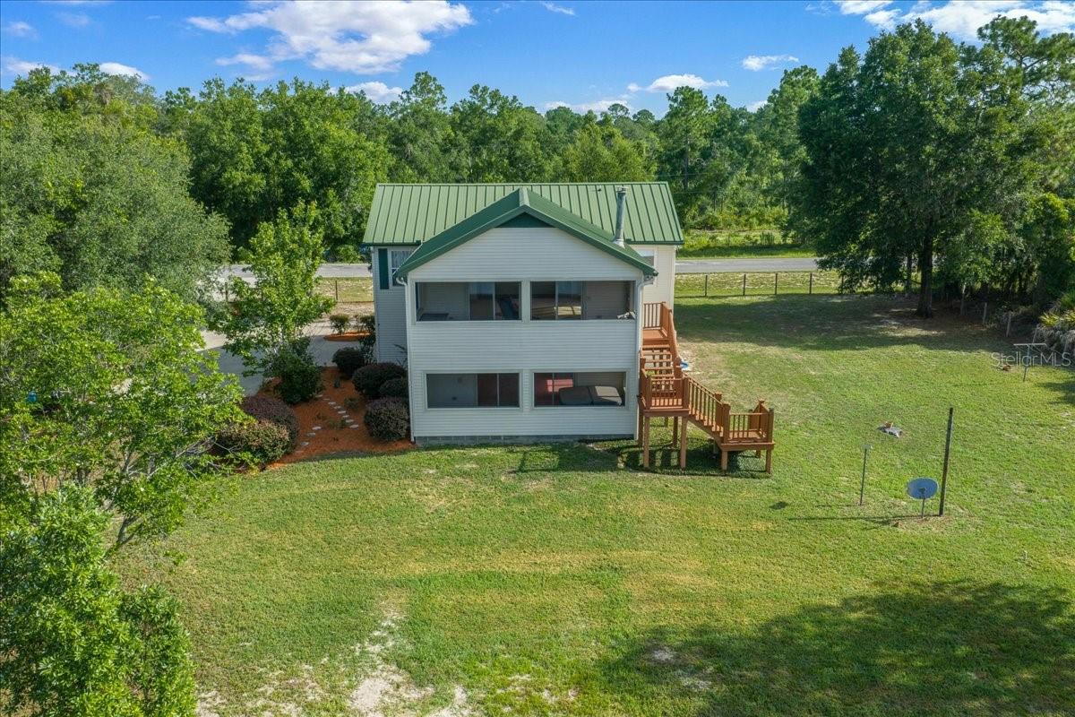 3rd image of 206 Malauka Radl, Ocklawaha, FL 32179 | MLS# OM728404
