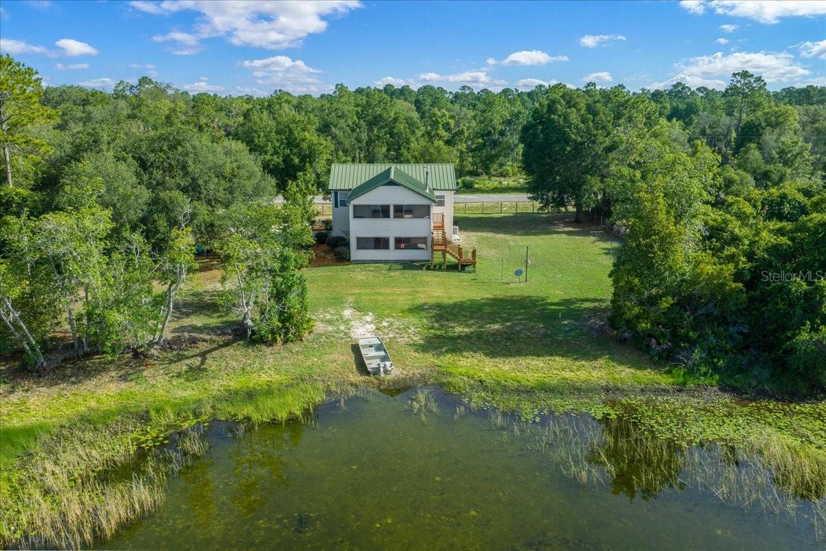 4th image of 206 Malauka Radl, Ocklawaha, FL 32179 | MLS# OM728404