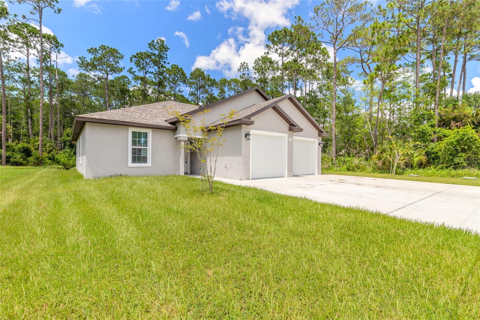 3rd image of 48 Regency Dr, Palm Coast, FL 32164 | MLS# V4950271
