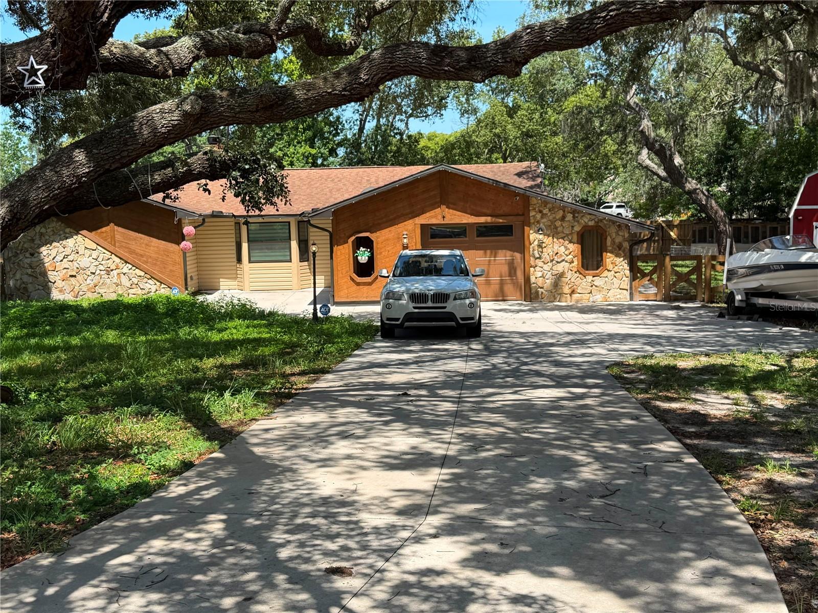 1st image of 325 Gulfport Ln, Spring Hill, FL 34608 | MLS# TB8531764
