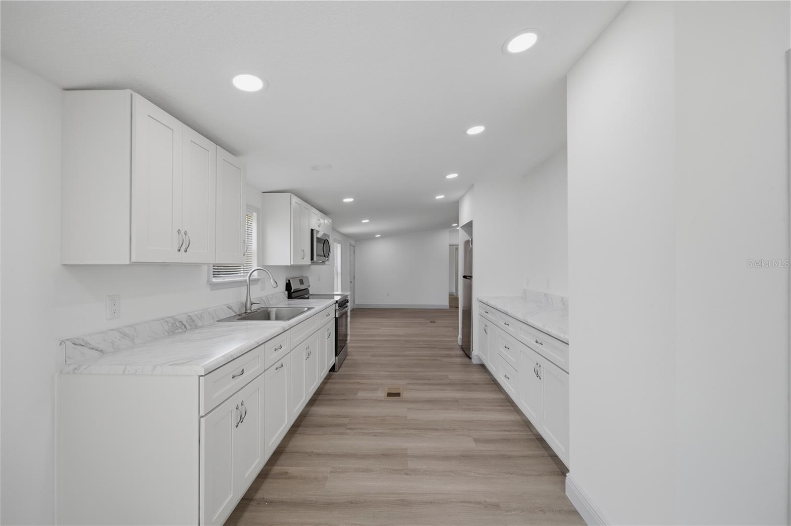 5th image of 7904 Cadillac Ave, Hudson, FL 34667 | MLS# W7887944