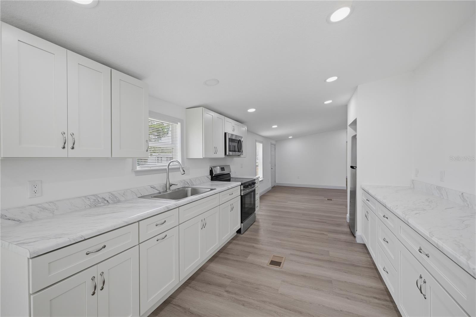3rd image of 7904 Cadillac Ave, Hudson, FL 34667 | MLS# W7887944