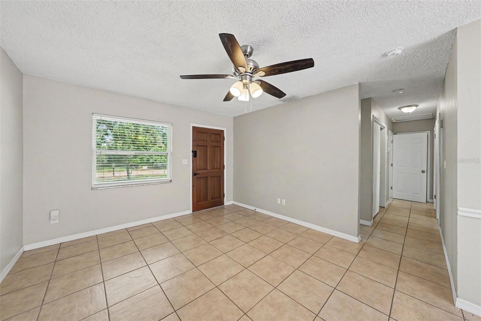 2nd image of 10410 N 27th St, Tampa, FL 33612 | MLS# O6428331