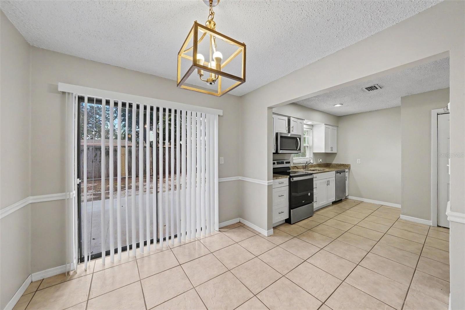 5th image of 10410 N 27Th St, Tampa, FL 33612 | MLS# O6428331