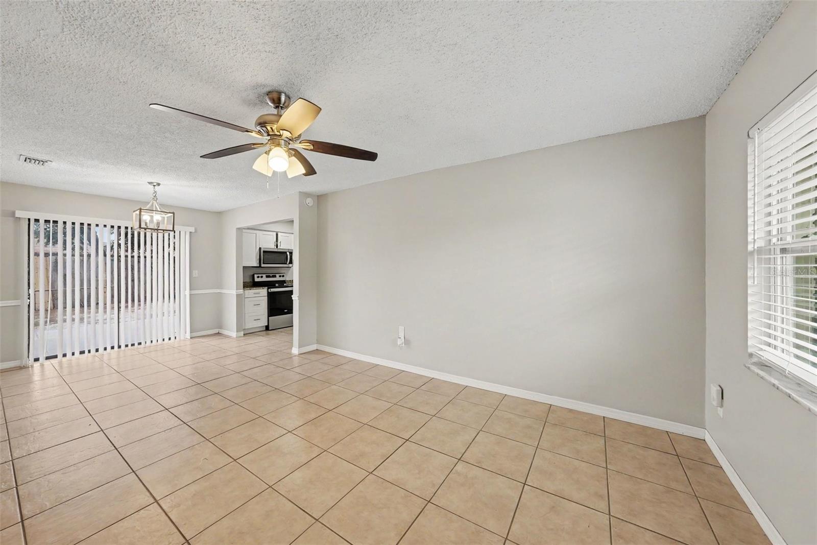 3rd image of 10410 N 27Th St, Tampa, FL 33612 | MLS# O6428331